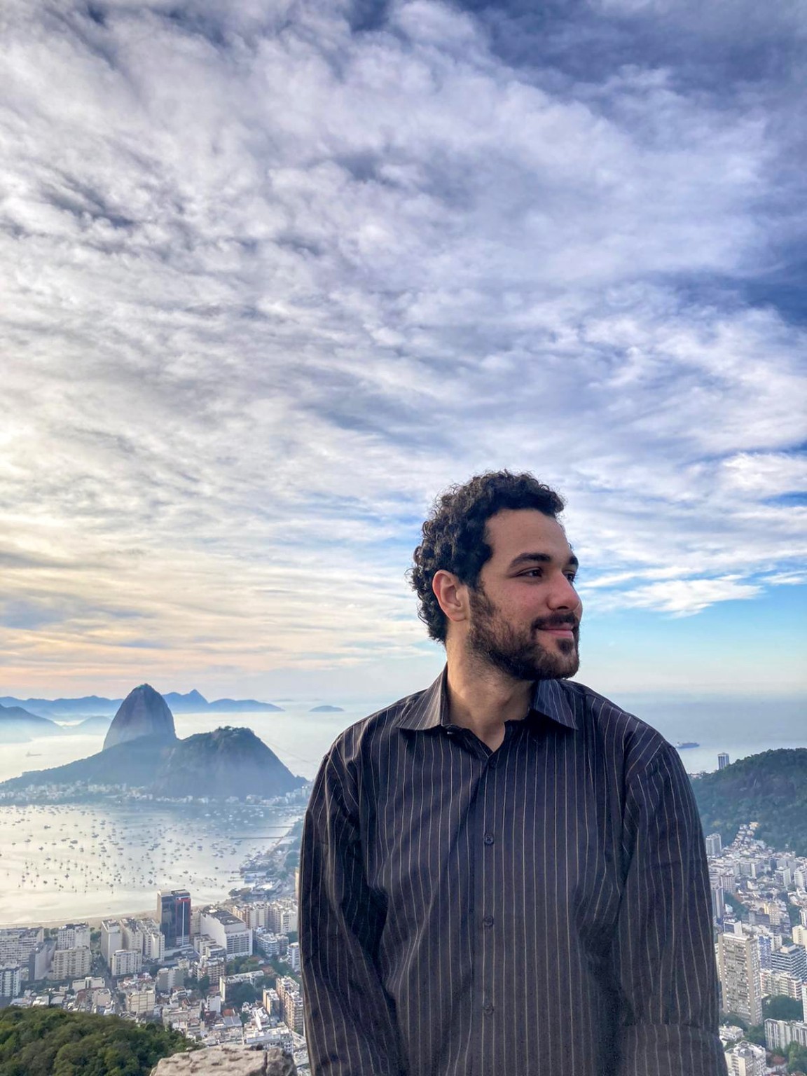 Hapi overlooking Rio de Janeiro and its mountains